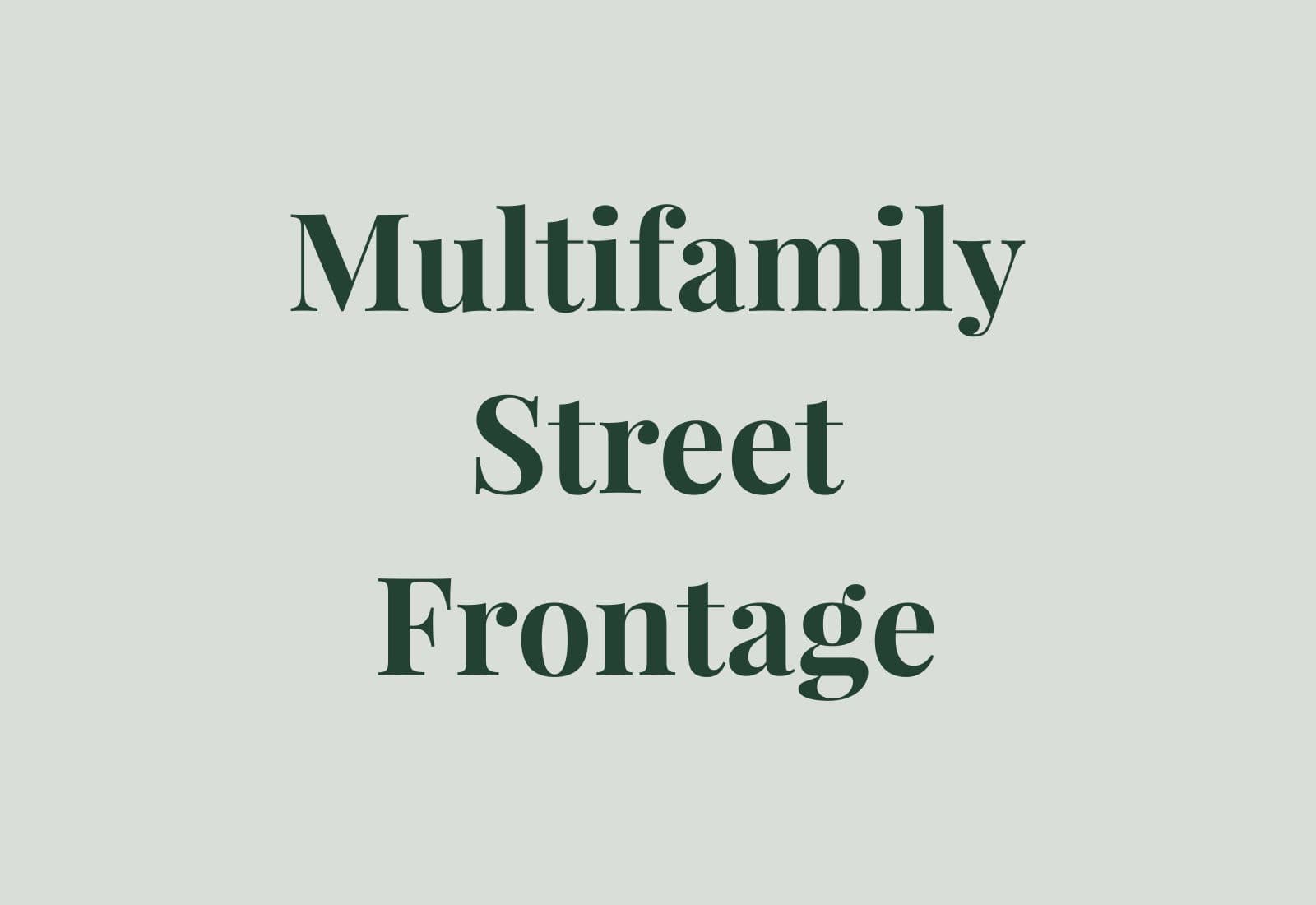 Multifamily building frontage with organized repetition, clean entries, and durable exterior materials.